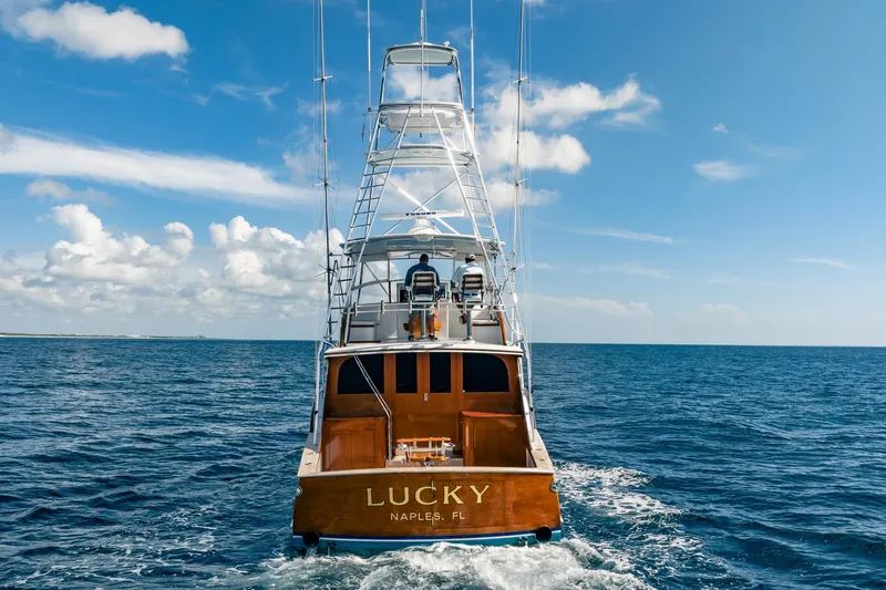 Slide: The Image of 1983 Rybovich 55 Convertible yacht "Lucky" cruising on open ocean, Naples, FL. - 107
