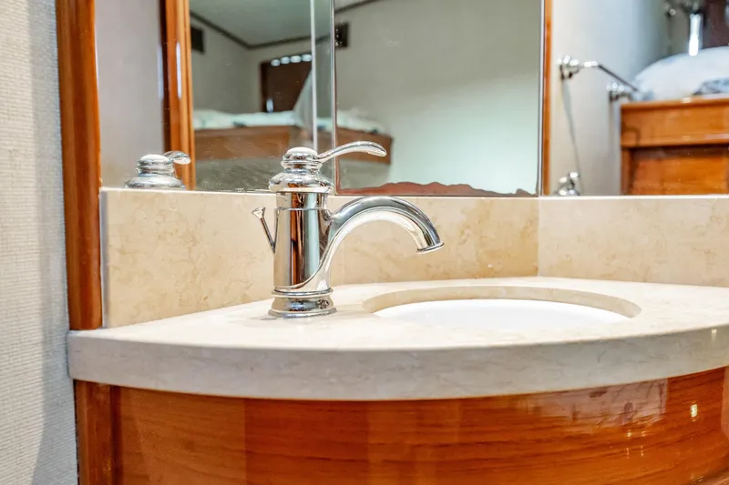 Slide: The Image of Luxurious bathroom sink in 1983 Rybovich 55 Convertible yacht. - 47