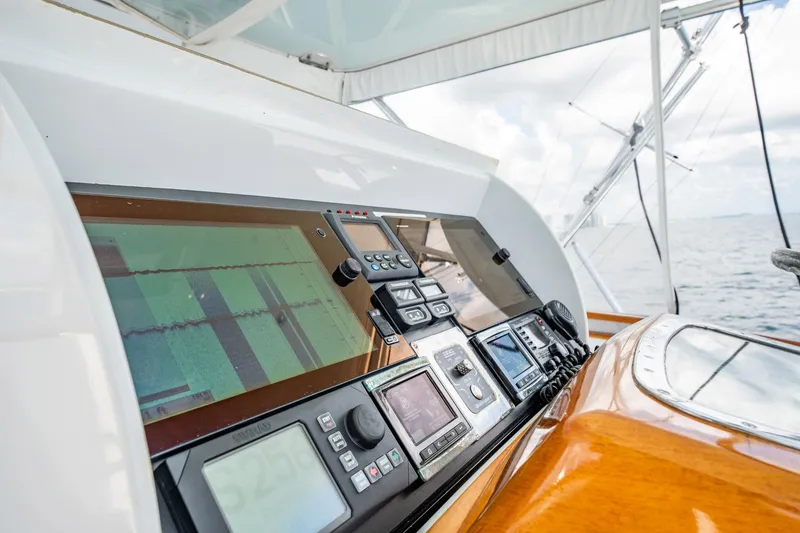 Slide: The Image of Control panel of 1983 Rybovich 55 Convertible yacht with navigation equipment. - 66