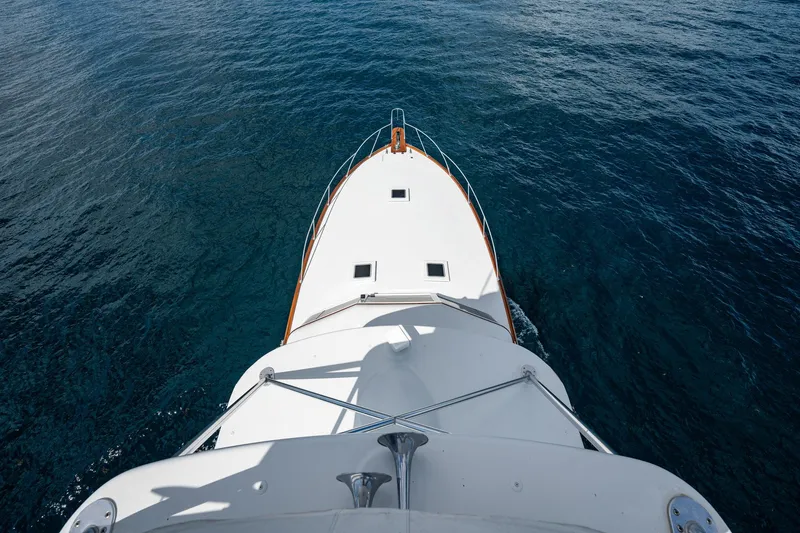 Slide: The Image of Aerial view of 1983 Rybovich 55 Convertible yacht cruising on open water. - 74