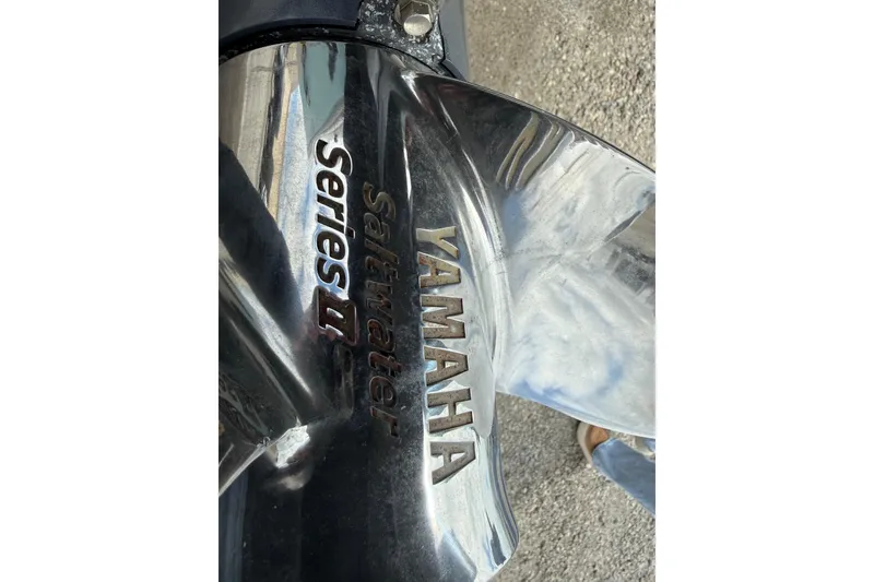 Slide: The Image of Close-up of Yamaha Saltwater Series II propeller on 2016 Cobia 277 Center Console. - 55
