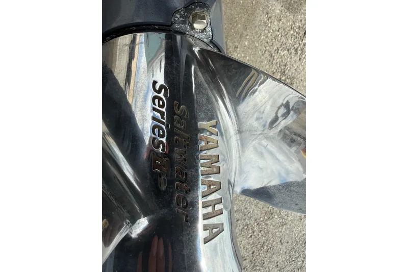 Slide: The Image of Close-up of Yamaha Saltwater Series II propeller on 2016 Cobia 277 Center Console boat. - 56