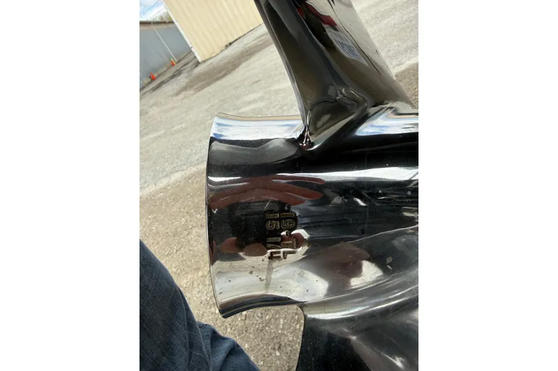 Slide: The Image of Close-up of a 2016 Cobia 277 Center Console boat propeller. - 57