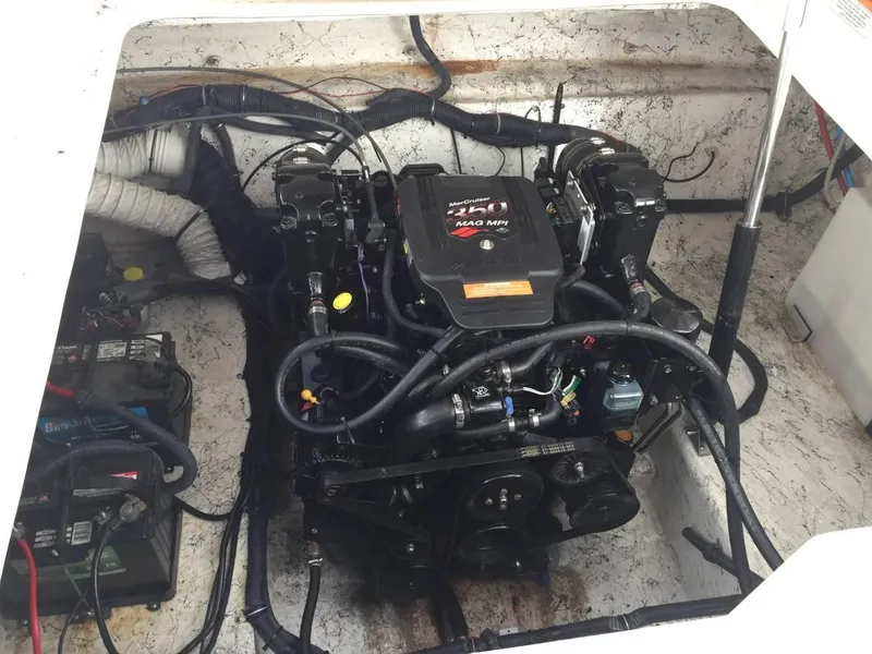 Slide: The Image of Engine compartment of a 2006 Rinker 270 Express Cruiser boat. - 6