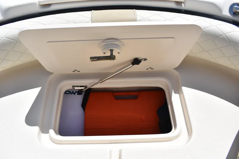 Slide: The Image of Storage compartment on a 2022 Carolina Skiff 21 Ultra Elite boat. - 10