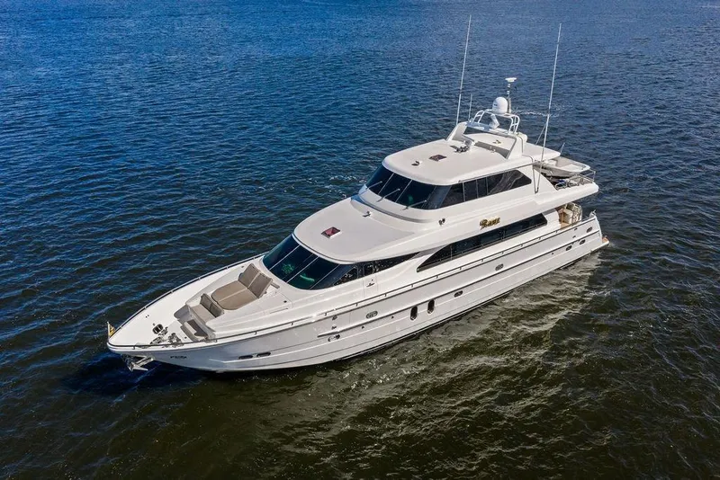 Slide: The Image of Luxurious 2005 Horizon 82 yacht cruising on open water. - 1