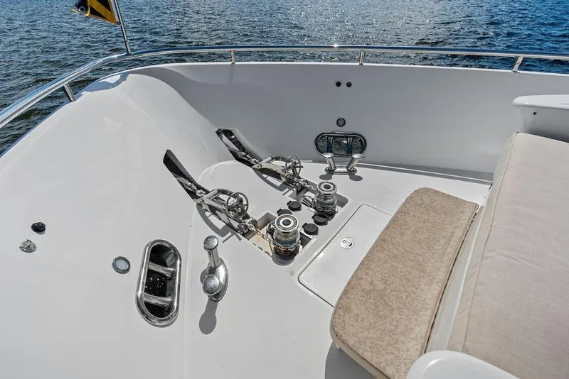 Slide: The Image of Bow deck of 2005 Horizon 82 yacht with anchor winches and seating. - 15