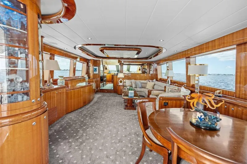 Slide: The Image of Luxurious 2005 Horizon 82 yacht interior with elegant wood finishes and panoramic ocean views. - 23