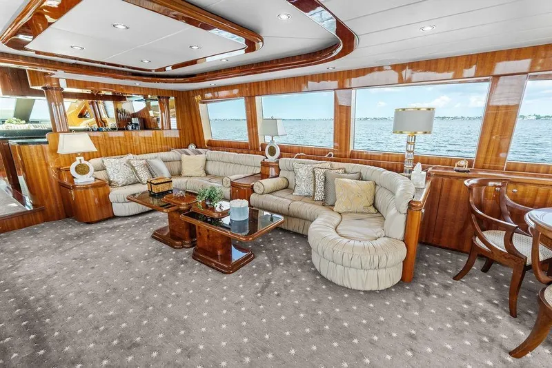 Slide: The Image of Luxurious interior of 2005 Horizon 82 yacht with elegant seating and ocean view. - 25