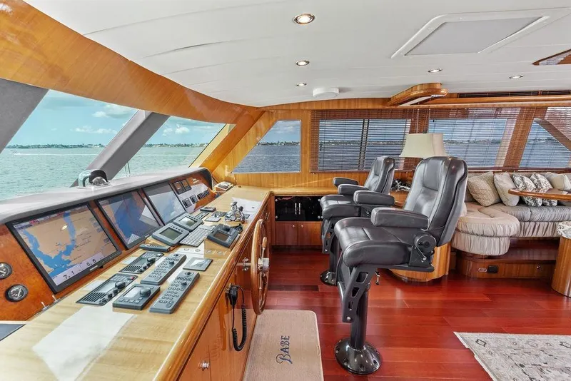 Slide: The Image of Luxurious 2005 Horizon 82 yacht interior with navigation controls and plush seating. - 41