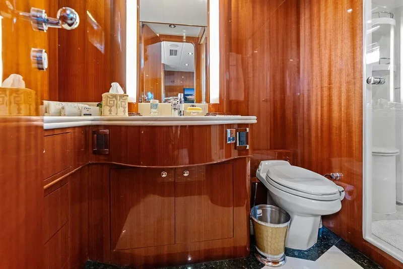 Slide: The Image of Luxurious yacht bathroom with wooden cabinetry, modern fixtures, and elegant design, Horizon 82, 2005. - 60