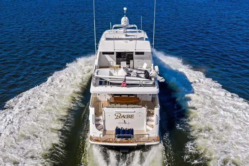 Slide: The Image of Luxury yacht Horizon 82 cruising on open water, 2005 model, rear view. - 7