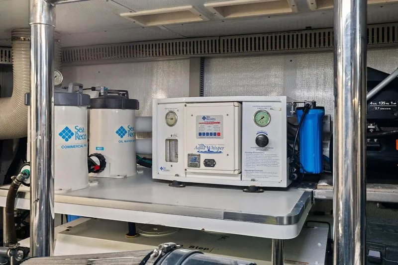 Slide: The Image of Marine equipment setup on Horizon 82 yacht, featuring Sea Recovery Aqua Whisper system. - 86