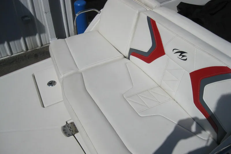 Slide: The Image of White and red seating on a 2014 Monterey M3 Sport Boat. - 13