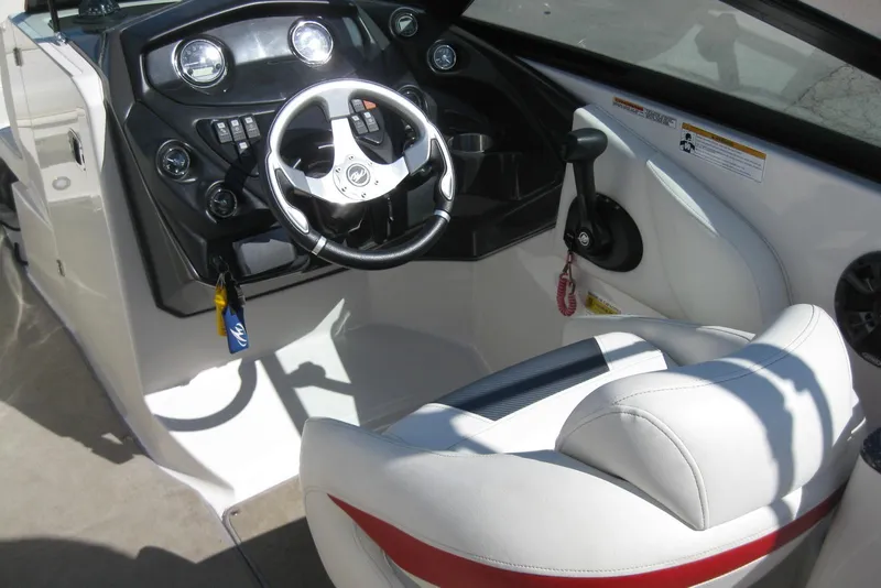Slide: The Image of Cockpit of 2014 Monterey M3 Sport Boat with steering wheel and control panel. - 21