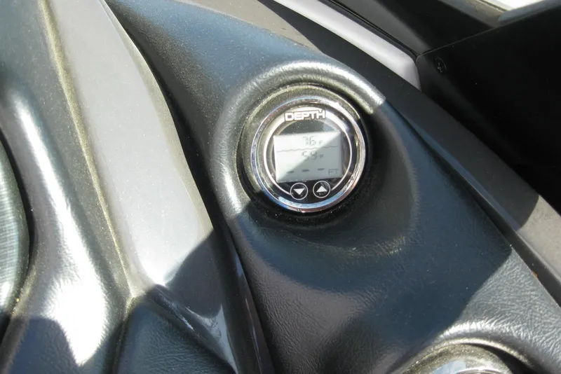 Slide: The Image of Depth gauge on 2014 Monterey M3 Sport Boat dashboard, displaying temperature and depth readings. - 23
