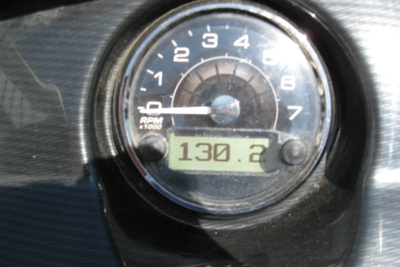 Slide: The Image of Tachometer of 2014 Monterey M3 Sport Boat displaying 130.2 RPM. - 24