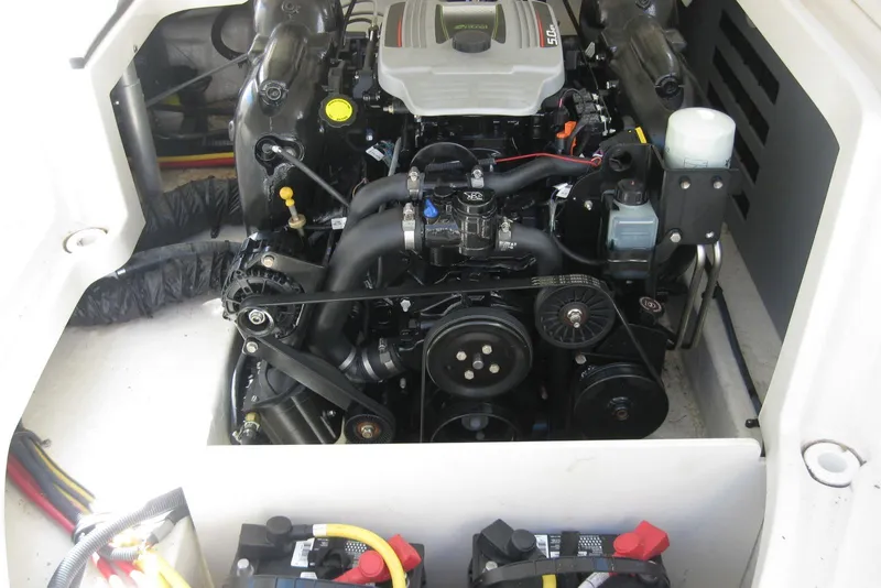 Slide: The Image of Engine compartment of a 2014 Monterey M3 Sport Boat, showcasing detailed mechanical components. - 32