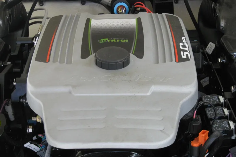Slide: The Image of Engine of a 2014 Monterey M3 Sport Boat, featuring a 5.0 MPI MerCruiser. - 33