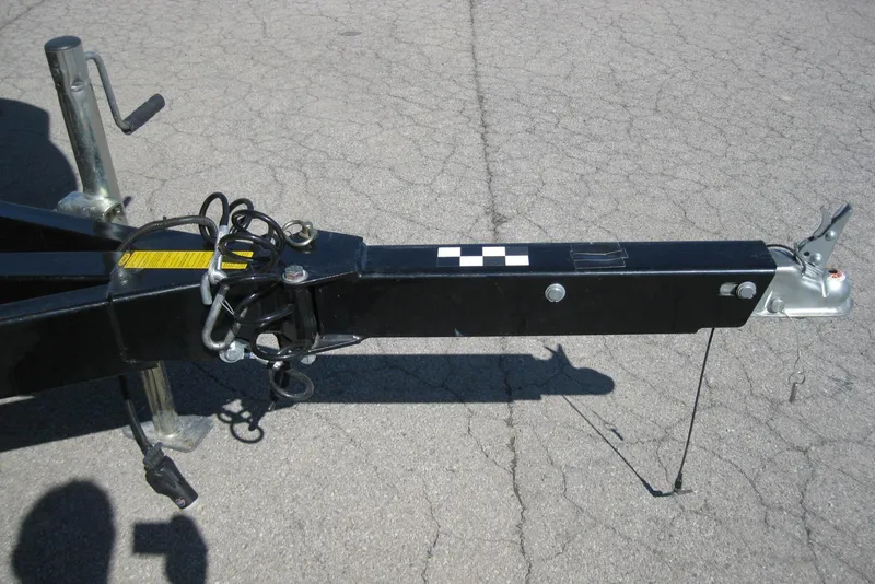 Slide: The Image of Trailer hitch of a 2014 Monterey M3 Sport Boat on asphalt surface. - 36
