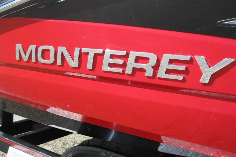 Slide: The Image of Red 2014 Monterey M3 Sport Boat with bold silver lettering. - 4