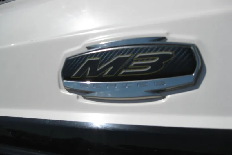 Slide: The Image of 2014 Monterey M3 Sport Boat emblem on white surface. - 5