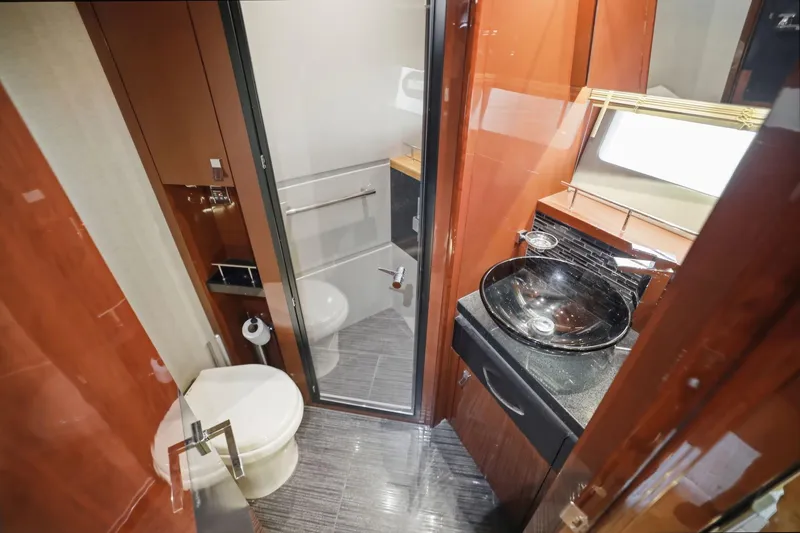 Slide: The Image of Luxurious bathroom interior of 2017 Sea Ray L590 yacht with modern fixtures and elegant design. - 101