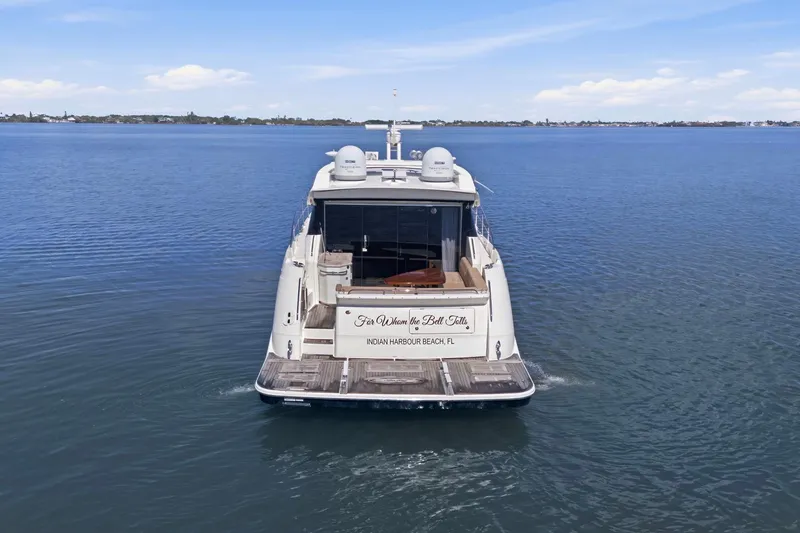 Slide: The Image of 2017 Sea Ray L590 yacht cruising on calm waters under a clear sky. - 22
