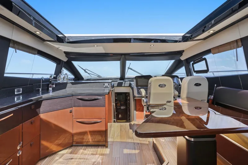 Slide: The Image of Luxurious interior of 2017 Sea Ray L590 yacht with modern helm and sleek design. - 74