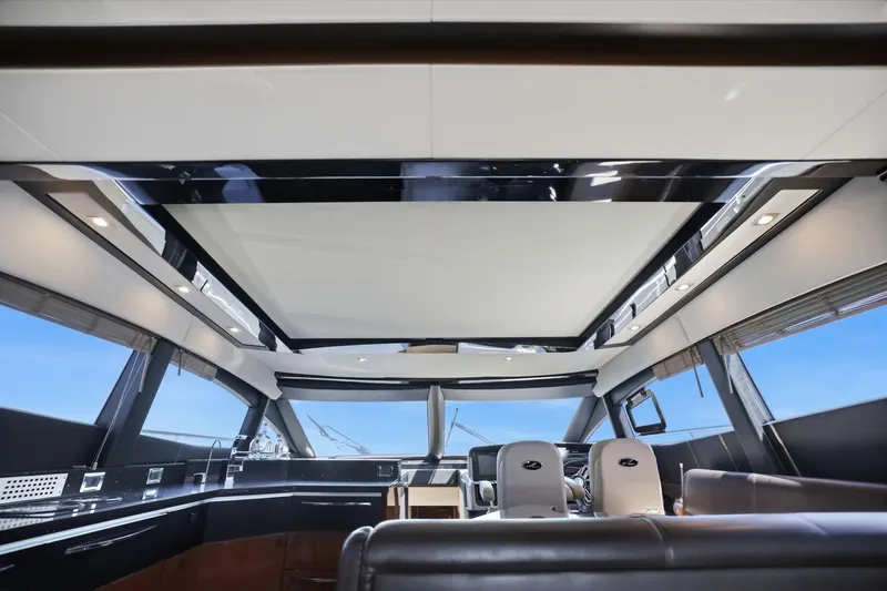 Slide: The Image of Luxurious interior of 2017 Sea Ray L590 yacht with modern design and panoramic windows. - 75