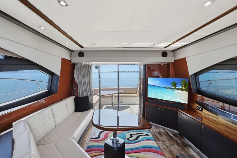 Slide: The Image of Luxurious interior of 2017 Sea Ray L590 yacht with ocean view and modern amenities. - 77