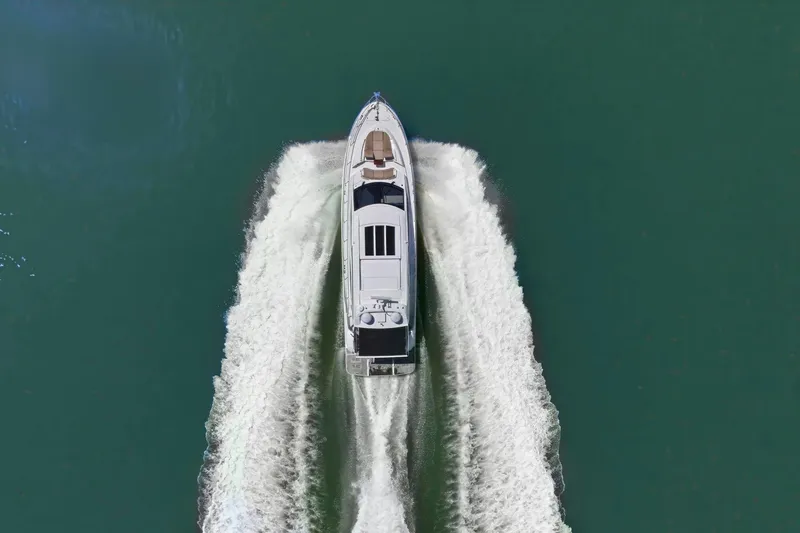 Slide: The Image of Aerial view of 2017 Sea Ray L590 yacht cruising on open water. - 8