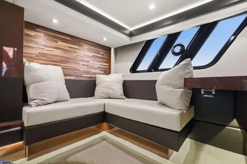 Slide: The Image of Luxurious interior of 2017 Sea Ray L590 yacht with plush seating and modern design. - 91