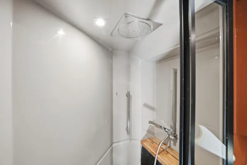 Slide: The Image of Luxurious shower area in 2017 Sea Ray L590 yacht with modern fixtures. - 93