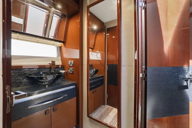 Slide: The Image of Luxurious bathroom interior of 2017 Sea Ray L590 yacht with modern fixtures and elegant design. - 95