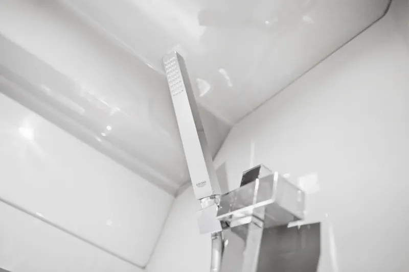 Slide: The Image of Modern shower fixture in 2017 Sea Ray L590 yacht bathroom. - 99