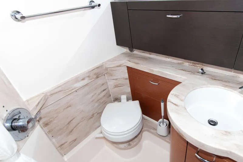 Slide: The Image of Luxurious bathroom in 2019 Pursuit S 408 Sport boat with modern fixtures and elegant design. - 33