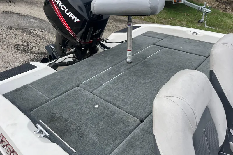 Slide: The Image of 2008 Stratos 176 XT boat with Mercury outboard motor and cushioned seating. - 11