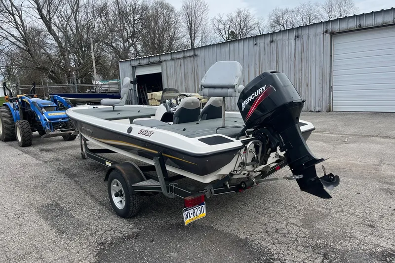 Slide: The Image of 2008 Stratos 176 XT boat with Mercury outboard motor on trailer. - 3