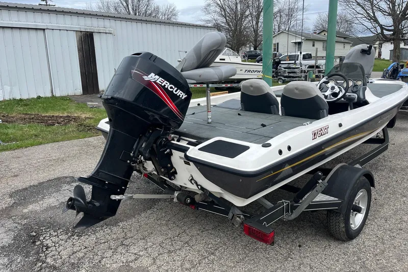 Slide: The Image of 2008 Stratos 176 XT boat with Mercury outboard motor on trailer. - 4