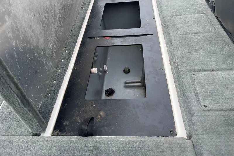Slide: The Image of Open storage compartment in a 2008 Stratos 176 XT boat interior. - 7