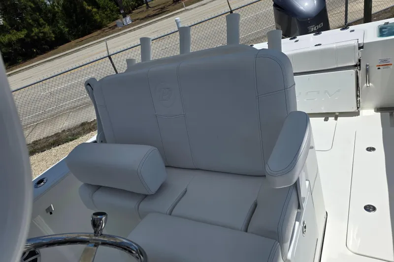 Slide: The Image of Luxury seating on 2026 Parker 254 FATHOM boat, featuring plush white upholstery and armrests. - 14