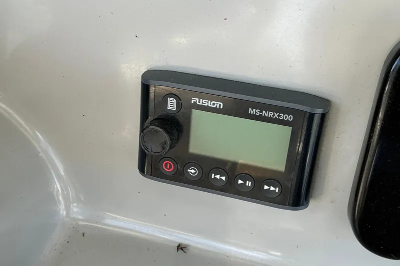Slide: The Image of Fusion MS-NRX300 marine stereo on 2017 Boston Whaler 250 Outrage boat dashboard. - 35
