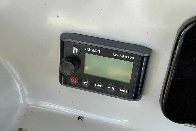 Slide: The Image of Fusion MS-NRX300 marine stereo control on 2017 Boston Whaler 250 Outrage boat. - 38