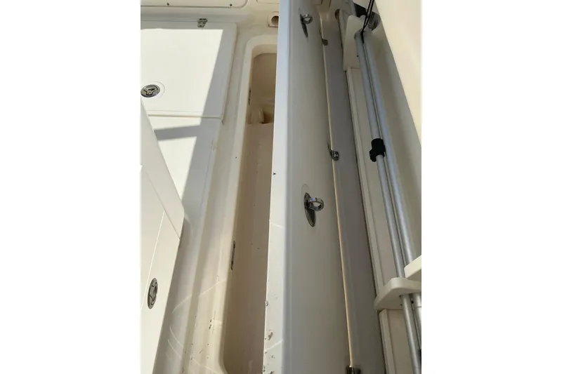 Slide: The Image of 2017 Boston Whaler 250 Outrage interior storage compartment detail. - 42