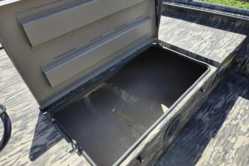 Slide: The Image of Open storage compartment in 2026 Havoc 1860 DBST boat, showcasing interior space. - 10
