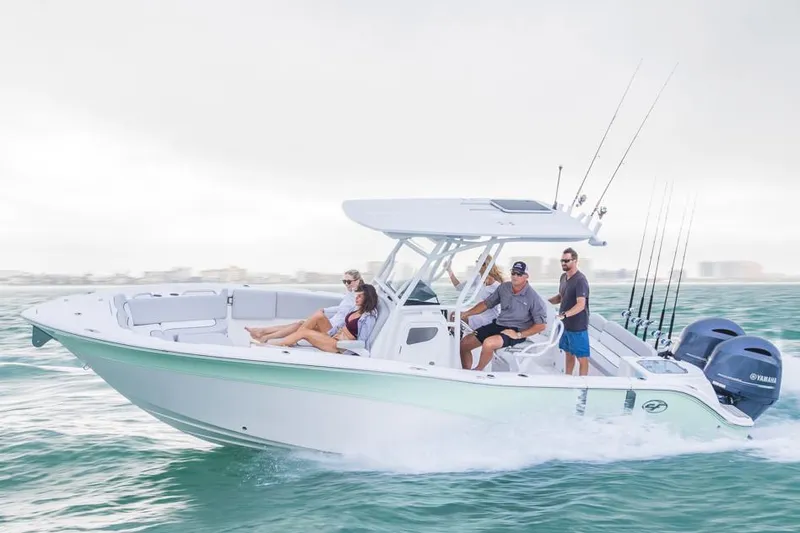 Slide: The Image of Manufacturer Provided Image: 2021 Sea Fox 268 Commander boat cruising with passengers on a sunny day. - 10