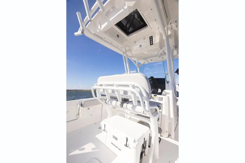 Slide: The Image of Manufacturer Provided Image: 2021 Sea Fox 268 Commander boat interior with seating and cooler. - 20