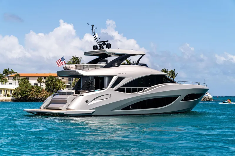 The Image of 2024 Aquitalia 78 Fly yacht cruising in clear blue waters, with modern design and luxury features. - 1