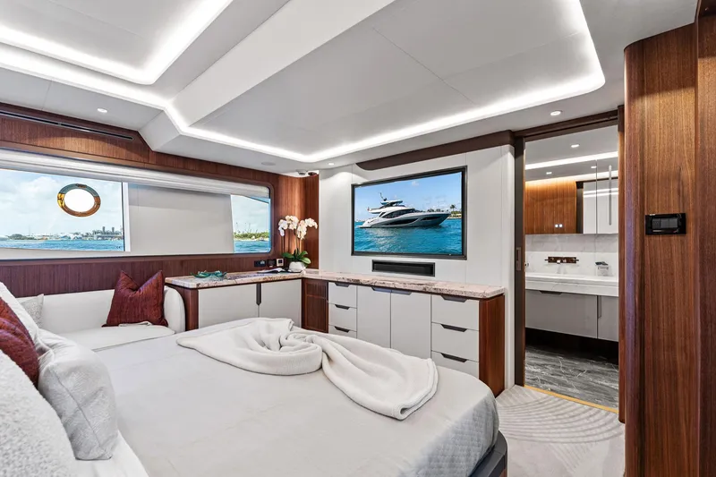 Slide: The Image of Luxurious 2024 Aquitalia 78 Fly yacht bedroom with modern decor and ocean view. - 33